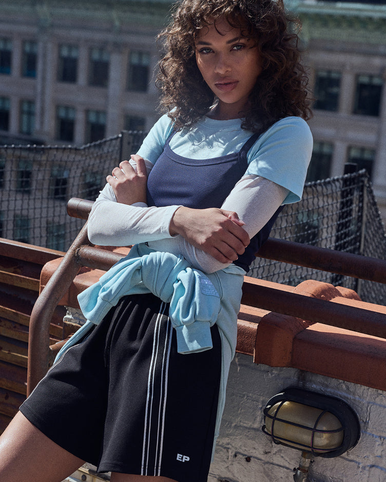 Summer '26 pairs relaxed tailoring with fitted tanks, oversized tees and polos, longline shorts and lightweight outerwear, designed for an easy everyday rotation. 