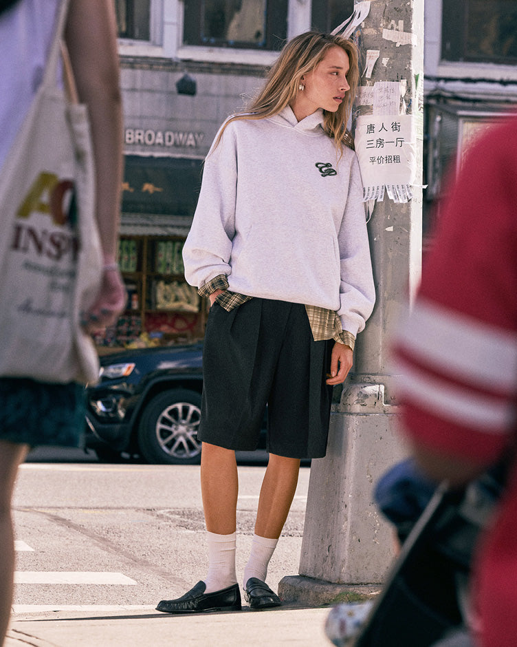Summer '26 pairs relaxed tailoring with fitted tanks, oversized tees and polos, longline shorts and lightweight outerwear, designed for an easy everyday rotation. 